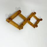 Accordion wall coat rack in solid pine