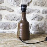 Sandstone lamp base decorated with flowers