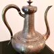 Oriental teapot made of crafted silver metal