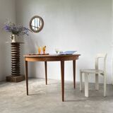 Scandinavian round teak table with extension