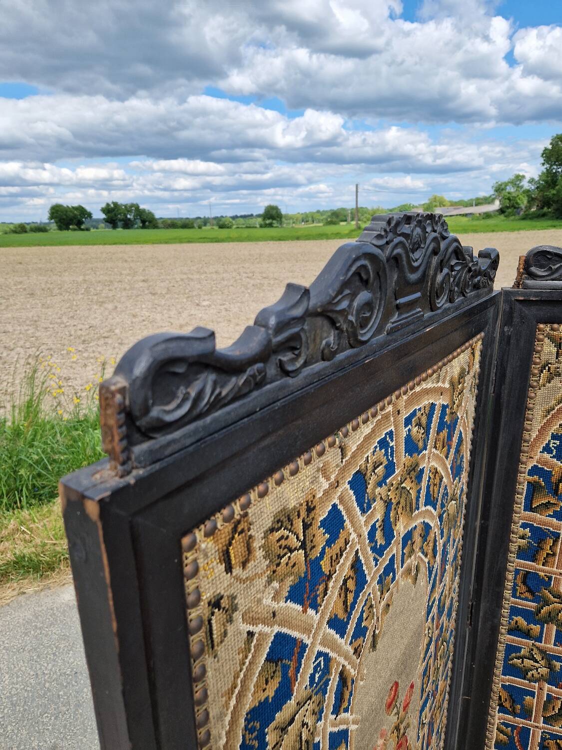 Folding screen in black-painted wood, 19th century