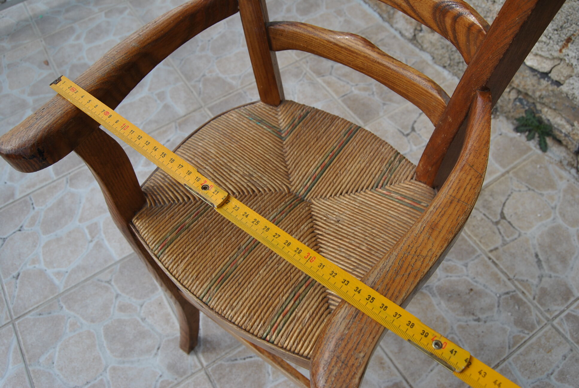Wooden children's high chair and mulched seat