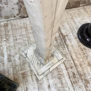 Set of 4 marble columns or pedestals.