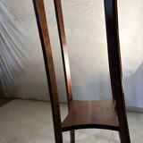 Vintage dark wood side table with curved base