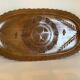 Carved wooden platter in Black Forest style.