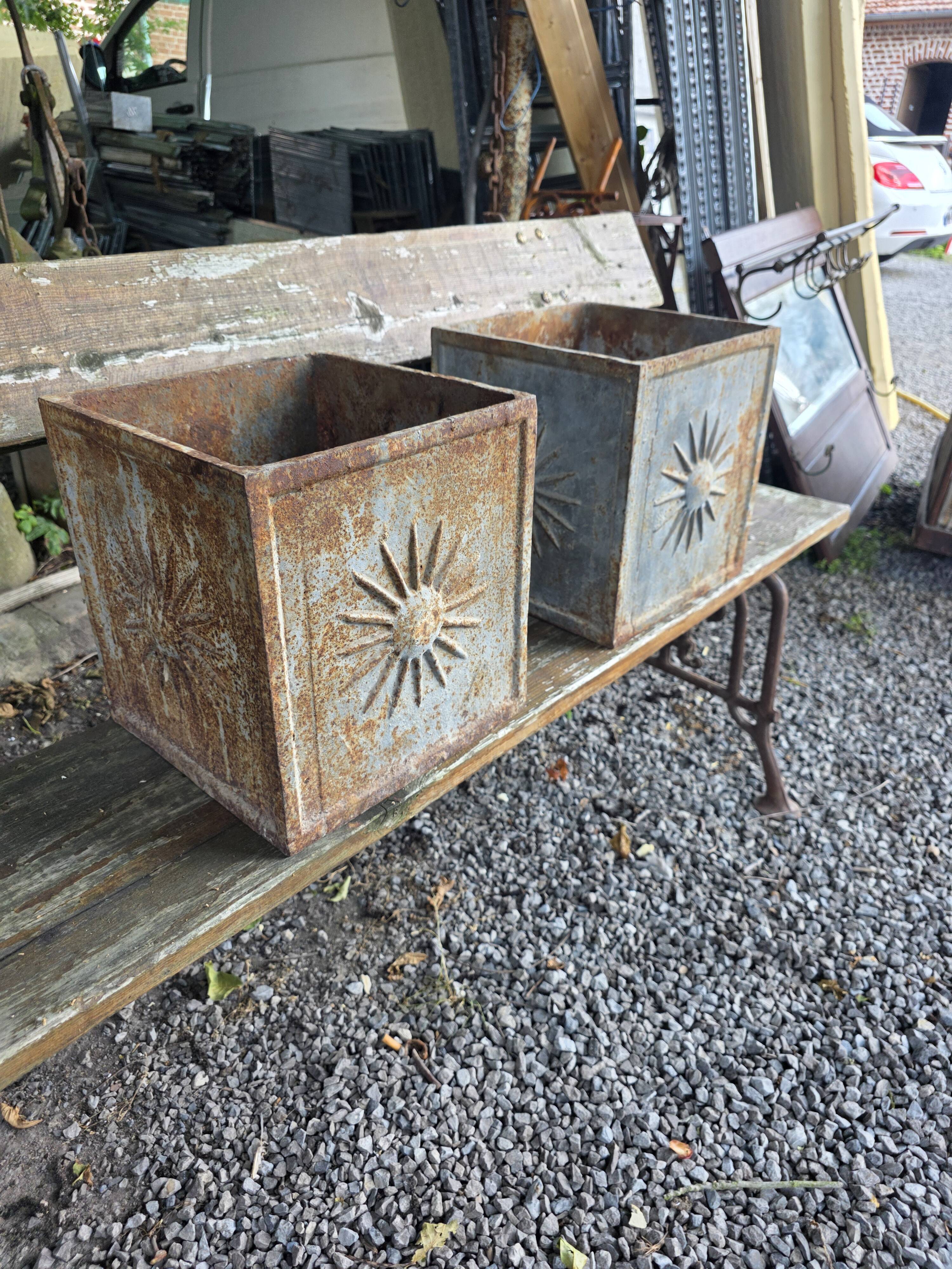 Pair of cast iron planters