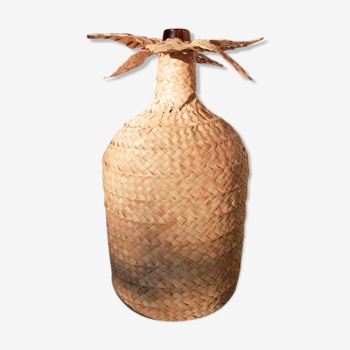 Demijohn covered with braiding