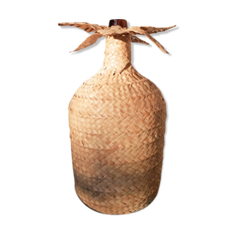 Demijohn covered with braiding
