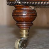 Pair of leather Chesterfield sofas by Howard & Sons