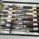 Box of 12 antique cheese or dessert knives. Steel and bovine horn.