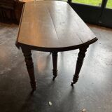 Old wooden table with folding flaps
