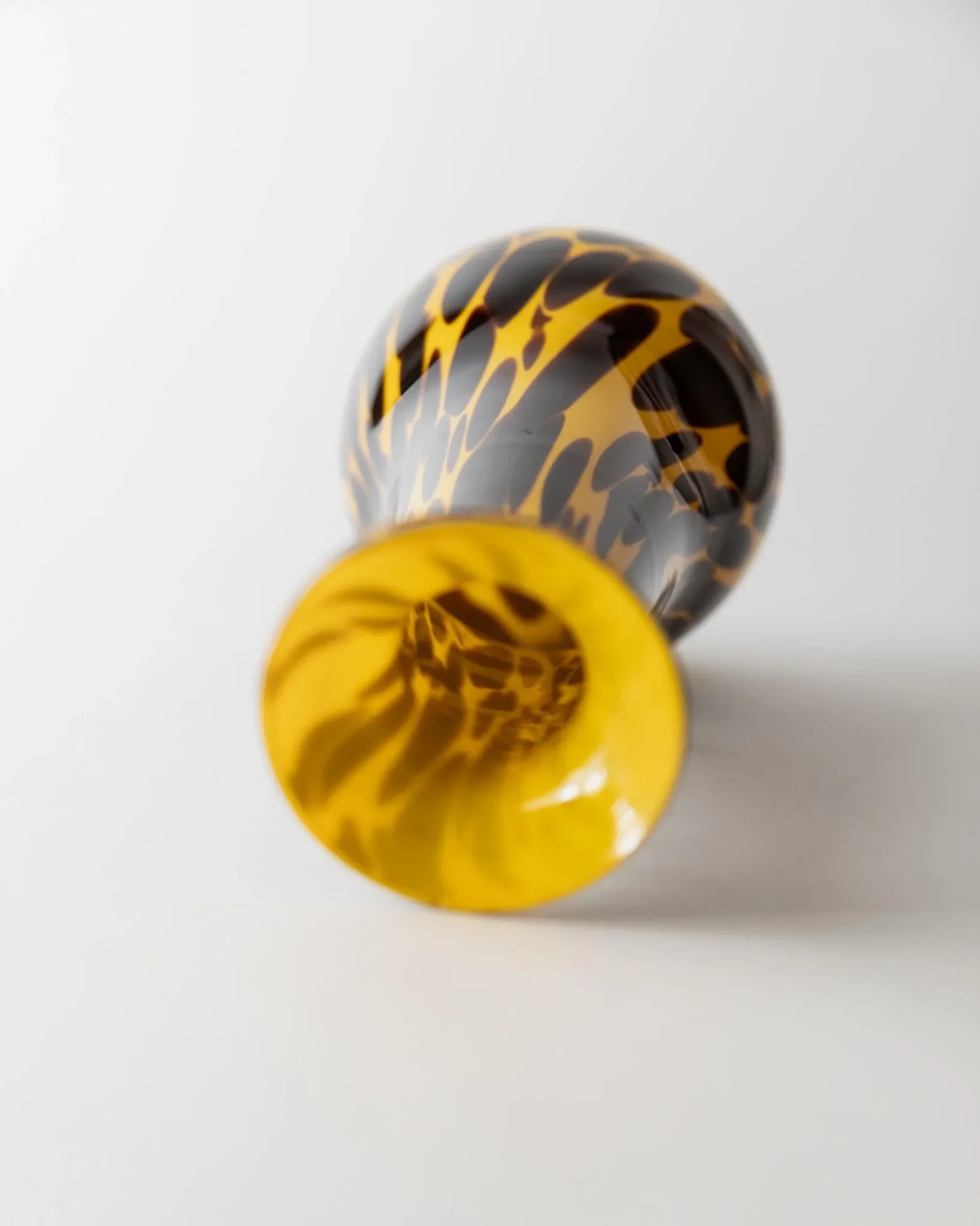 Vintage Murano glass vase from the 1990s, yellow art glass with black spots, postmodern Italian design.