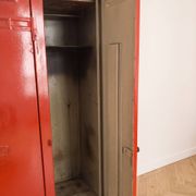 Vintage industrial wardrobe with 4 metal doors in red.