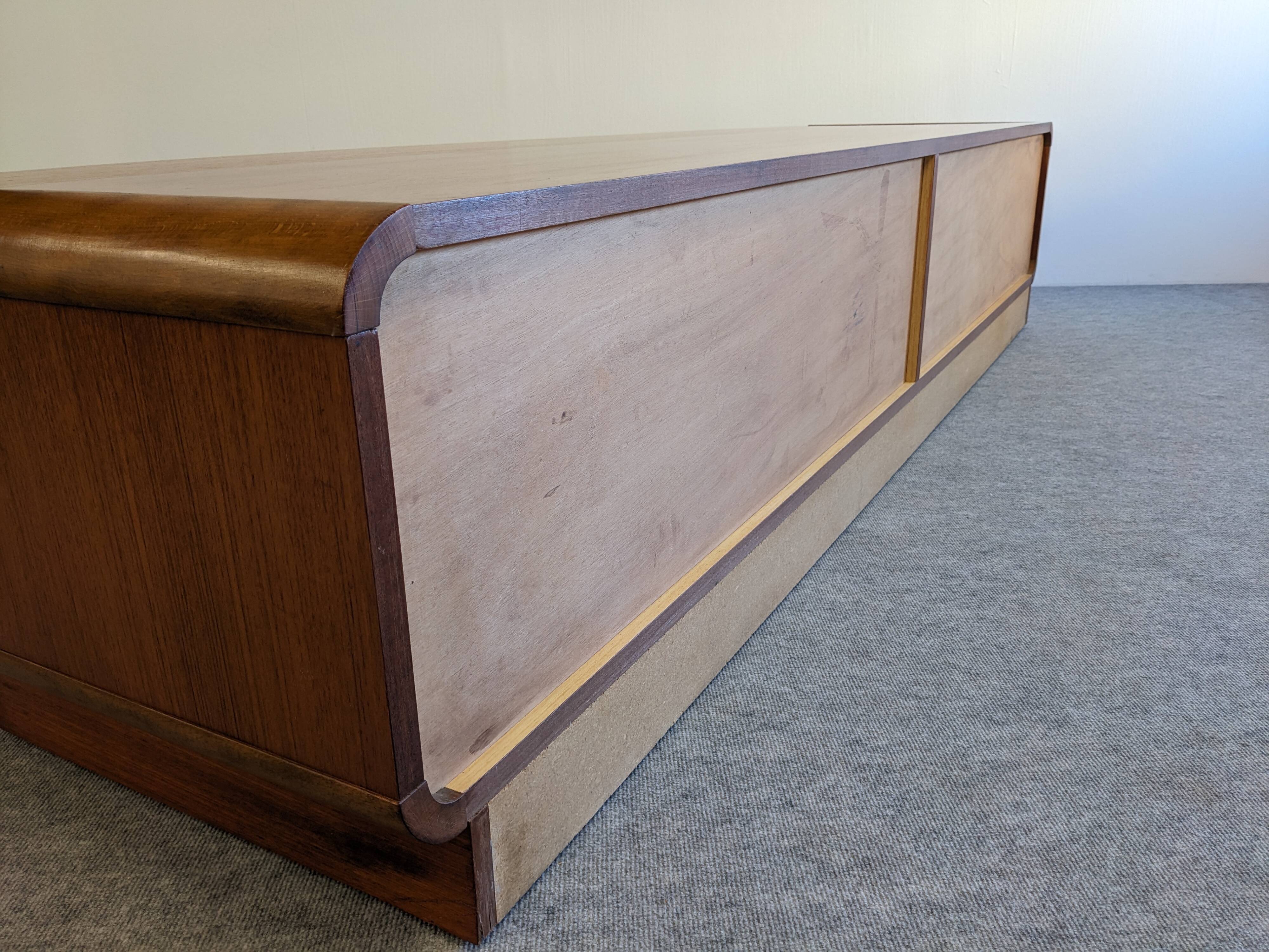 Low Space Age teak sideboard from the 60s/70s