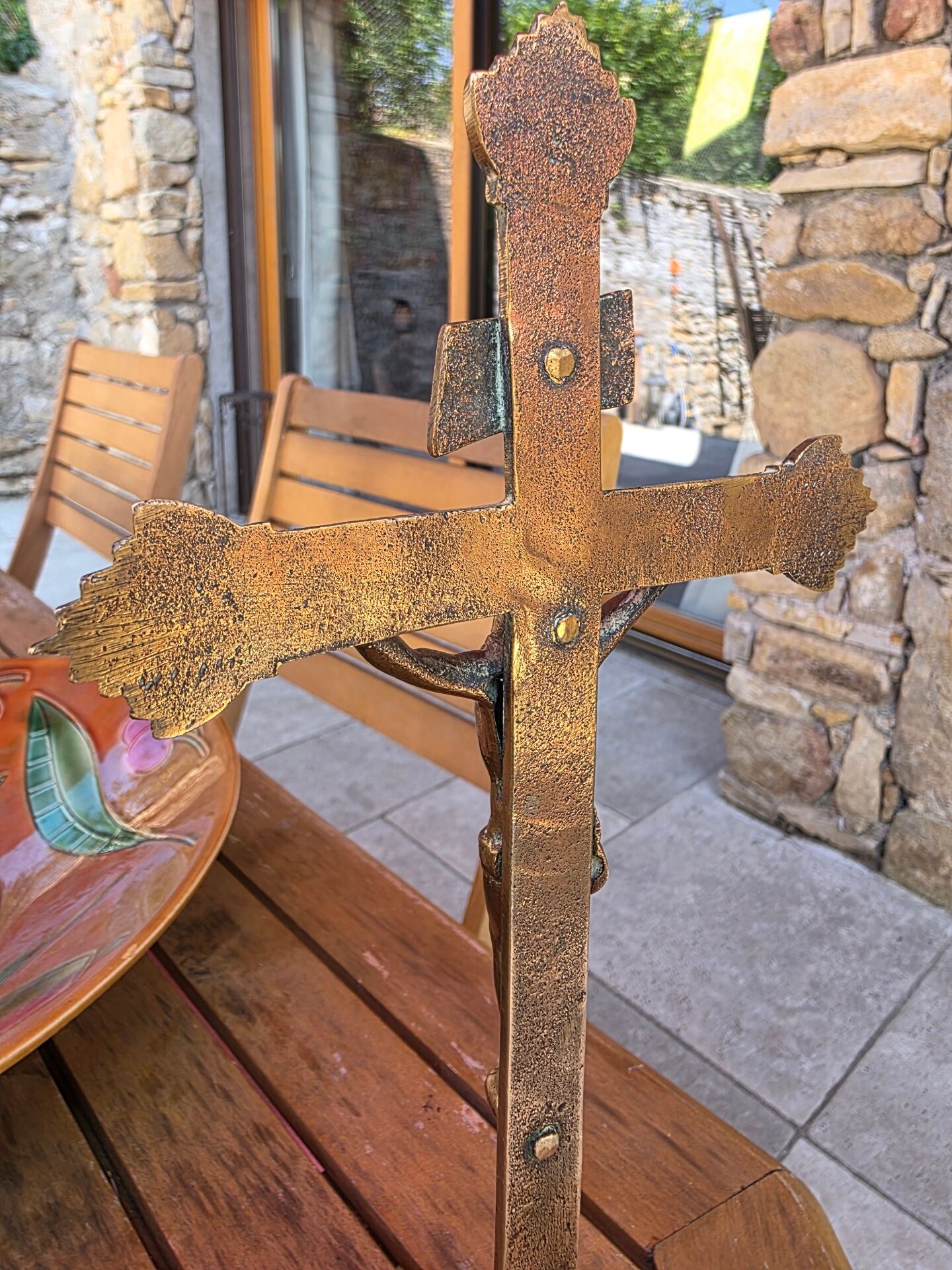 19th-century brass crucifix on a base