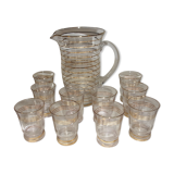 Service in glass pitcher and 10 glasses