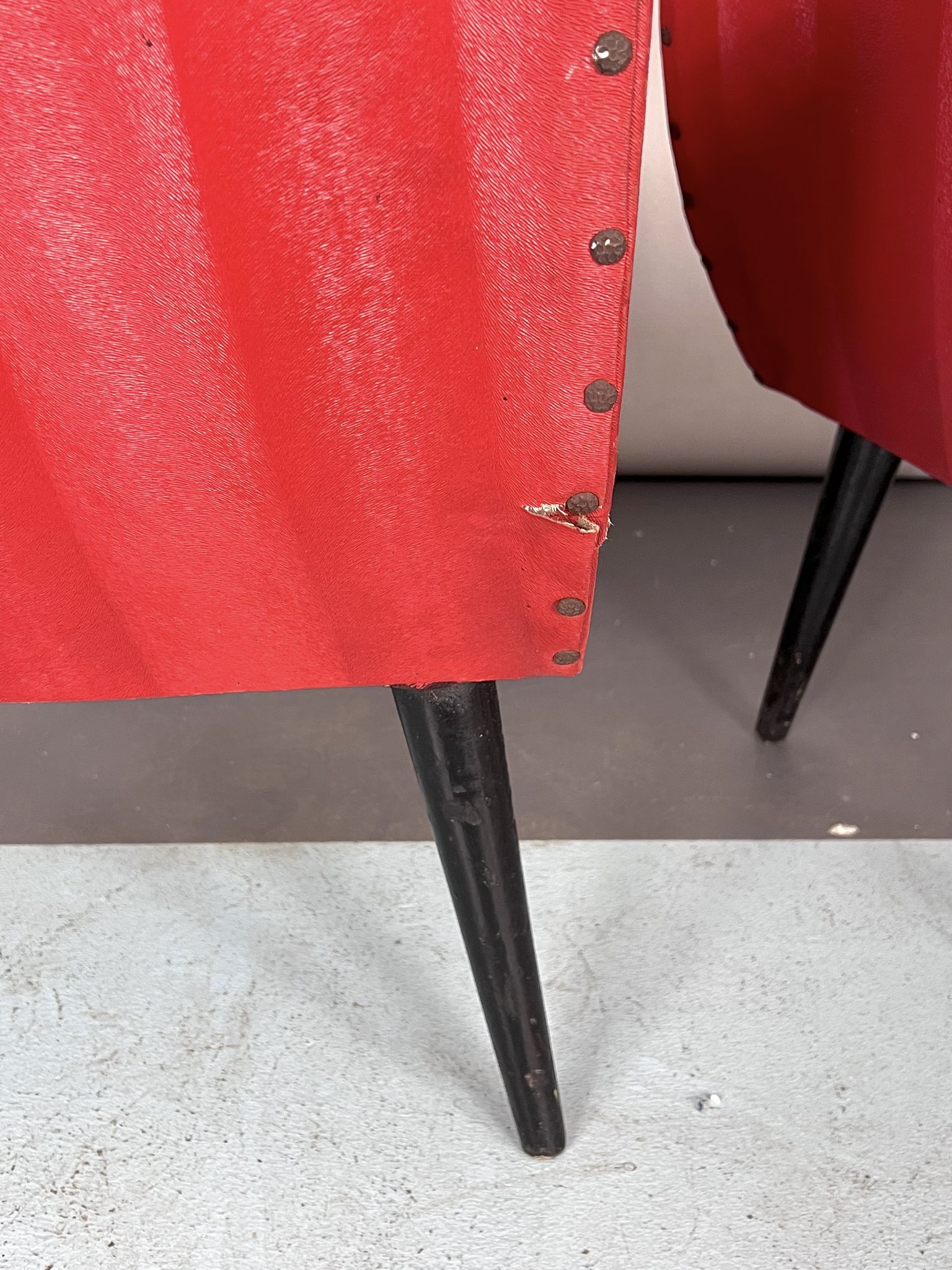 Mid-century modern pair of red armchairs. italy 1950s
