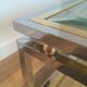 Table basse à double plateau en chrome et laiton