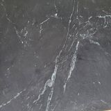 Coffee table or black marble and brass display "in its own juice"