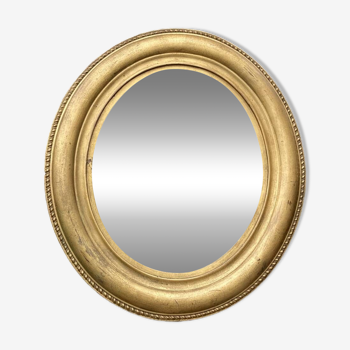 Miroir ancien doré ovale
