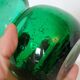 Small green bubbled blown glass vase