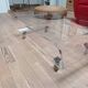 Design coffee table from Habitat in transparent plexiglass, mounted on wheels.