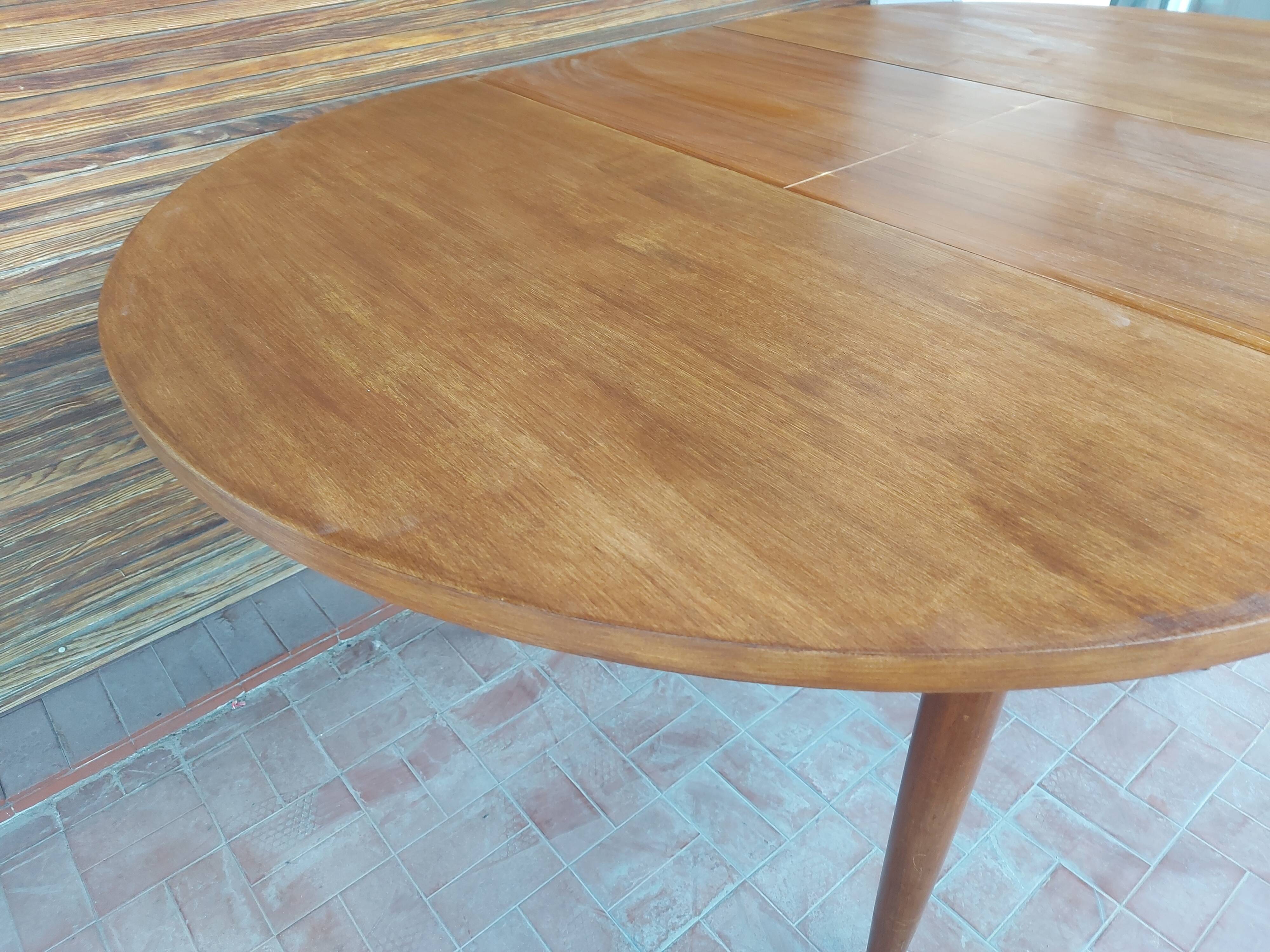Scandinavian design teak table with extension cord