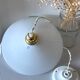 Suspension in opaline