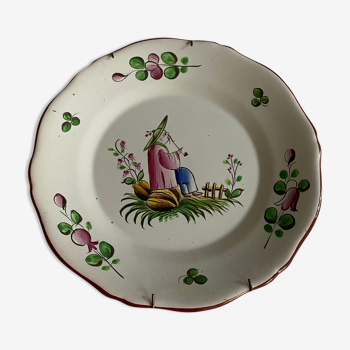 Plate of Nevers in earthenware late eighteenth century decoration of Chinese with pipe