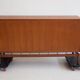 Buffet Ilmari Tapiovaara in teak with fabric and brass details.