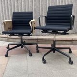 2 Charles Eames EA118 armchairs