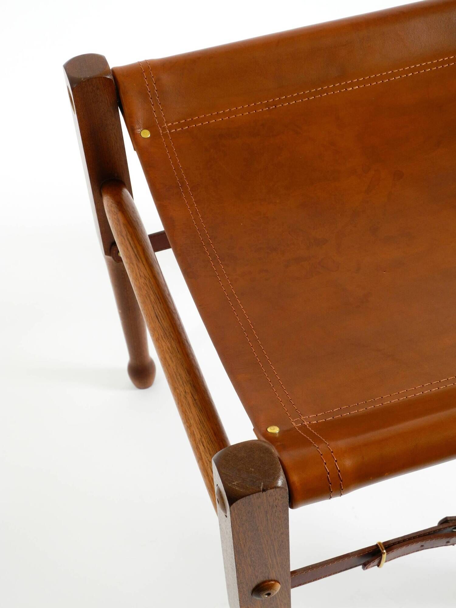 Rare 1990s safari stool with a teak frame and a seat made of brown saddle l