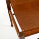 Rare 1990s safari stool with a teak frame and a seat made of brown saddle l