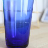 Set of 6 coloured glasses with brass base/basket