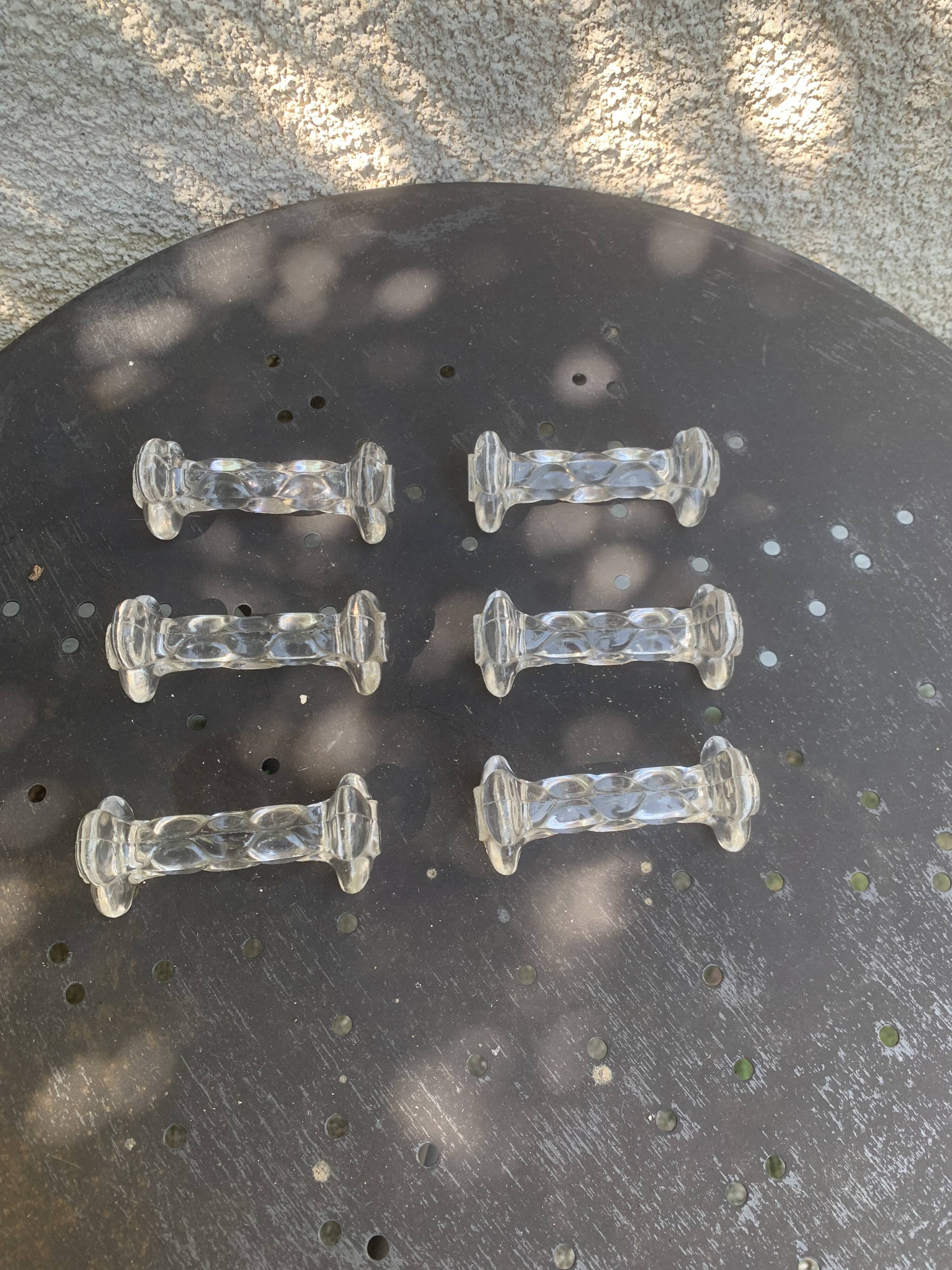 6 transparent glass knife holders, flower shape, antique twists