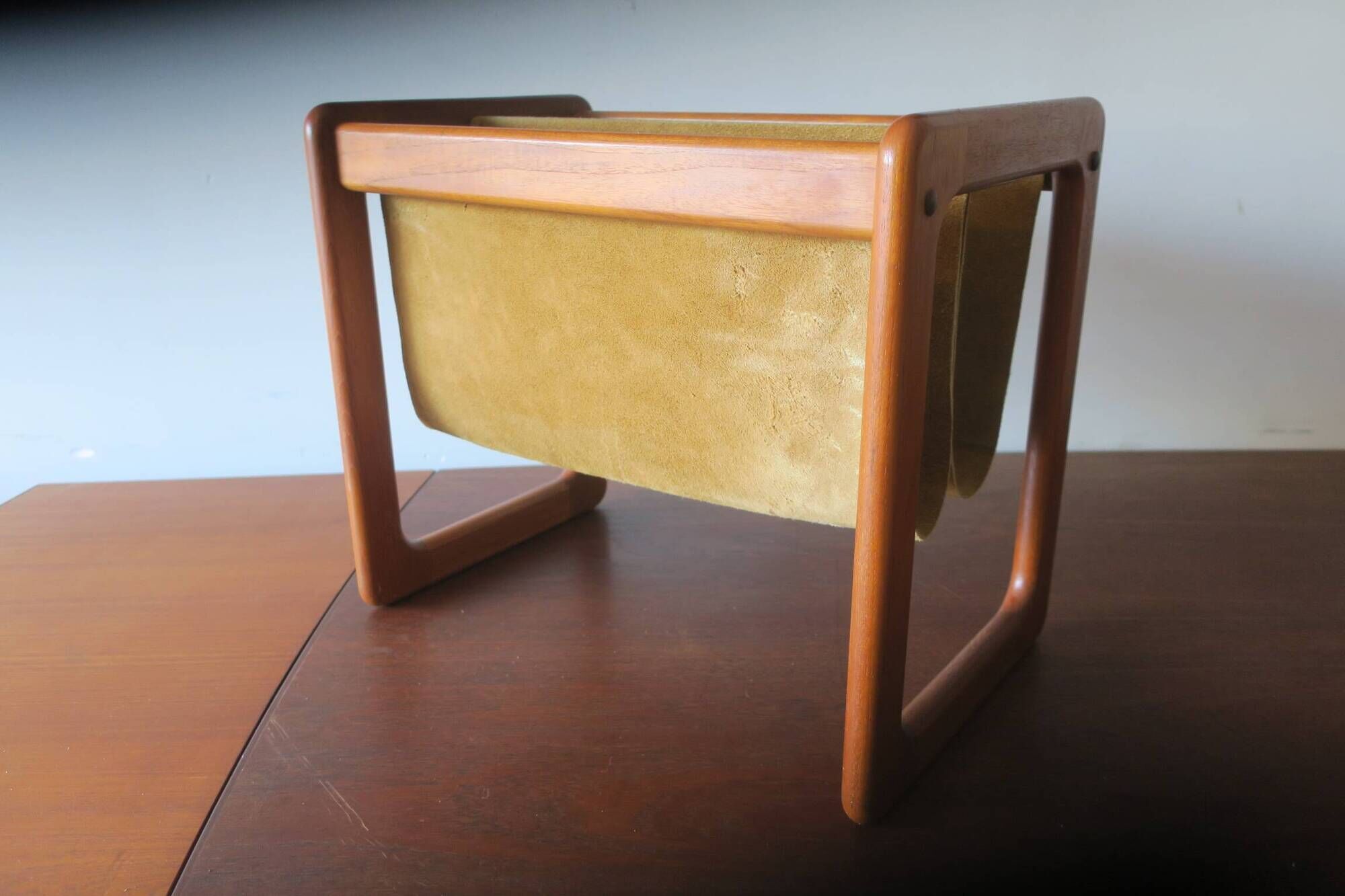 Magazinr rack in teak and suede leather by Aksel Kjersgaard, 1960s
