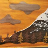 Beautiful wall-mounted Swedish fabric print with motifs of mountains, reindeer and more.