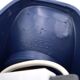 Tissot wall light in dark blue with a white opaque glass globe