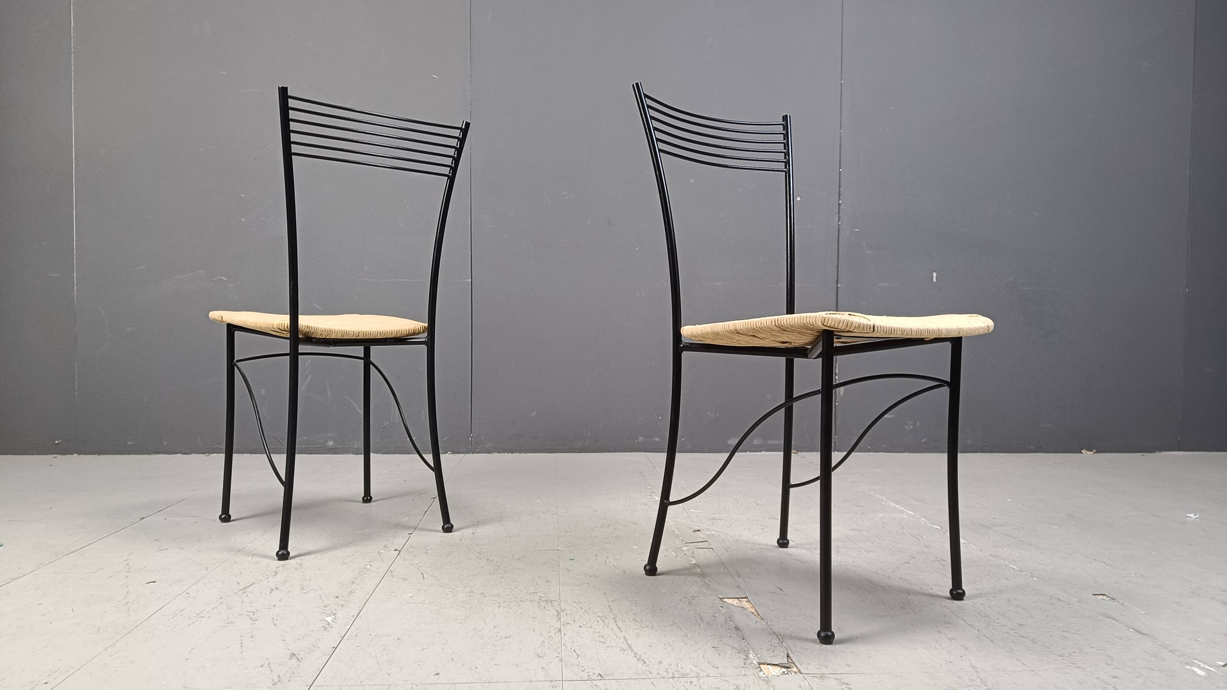 Vintage black metal and wicker italian bistro chairs.  Beautiful, elegant i