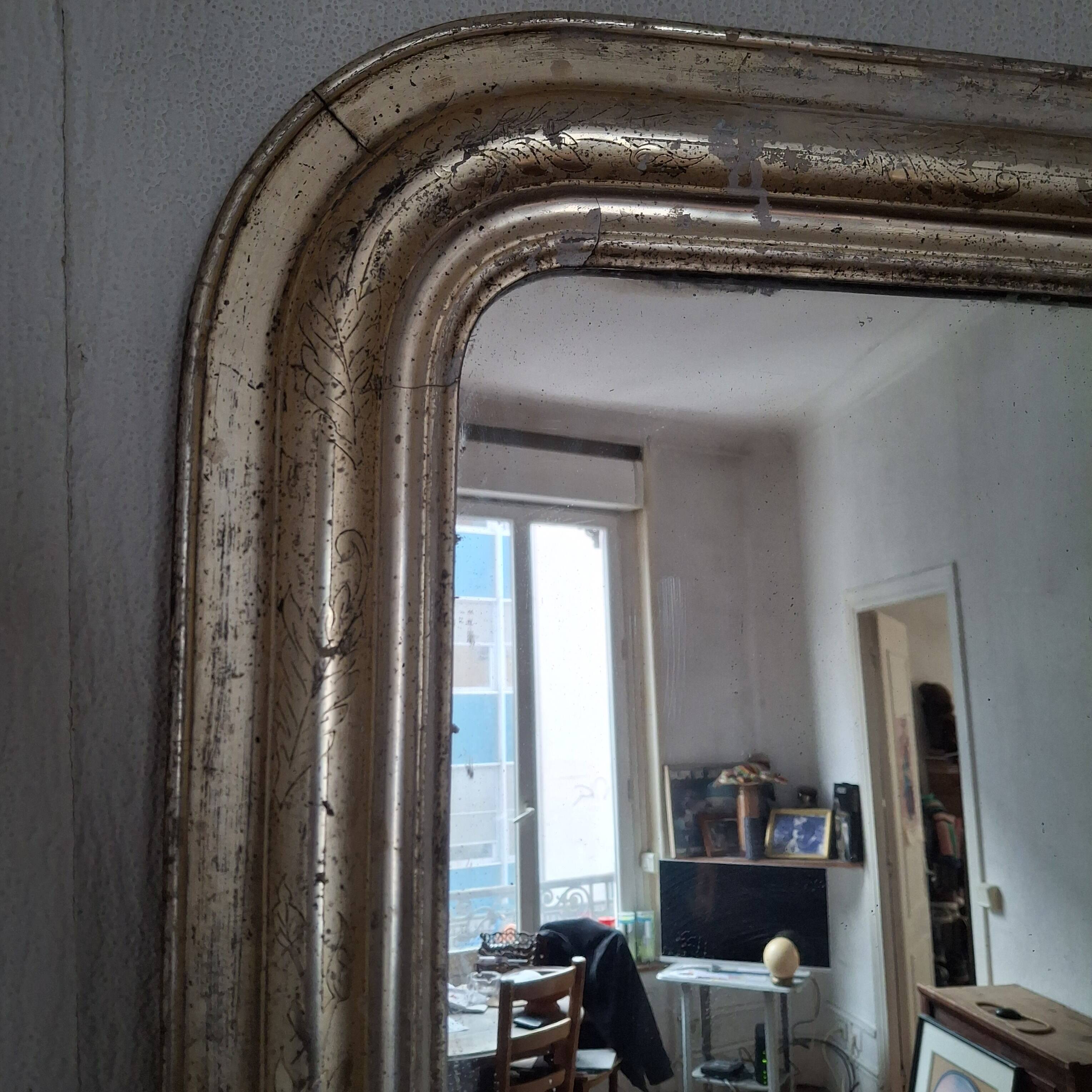 Antique Louis Philippe silvered mirror.