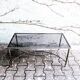 Table basse métal et verre fumé