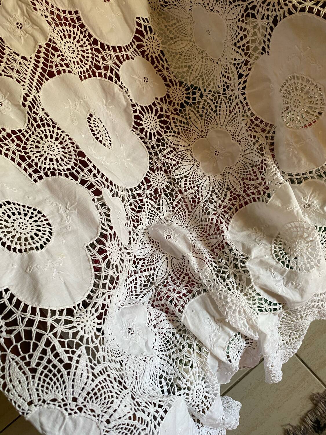 White cotton tablecloth with crochet lace.