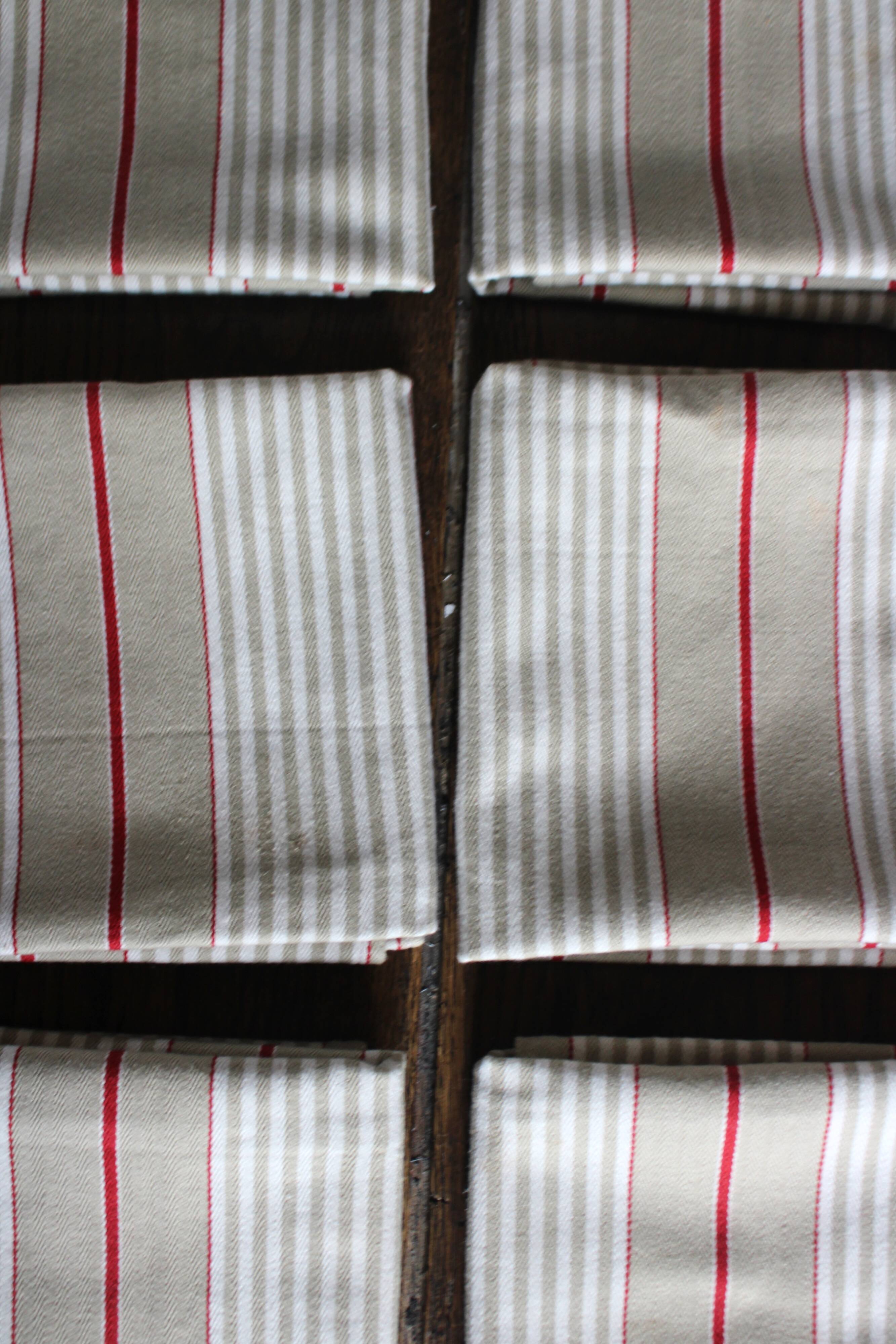 6 beige and red mattress cloth napkins