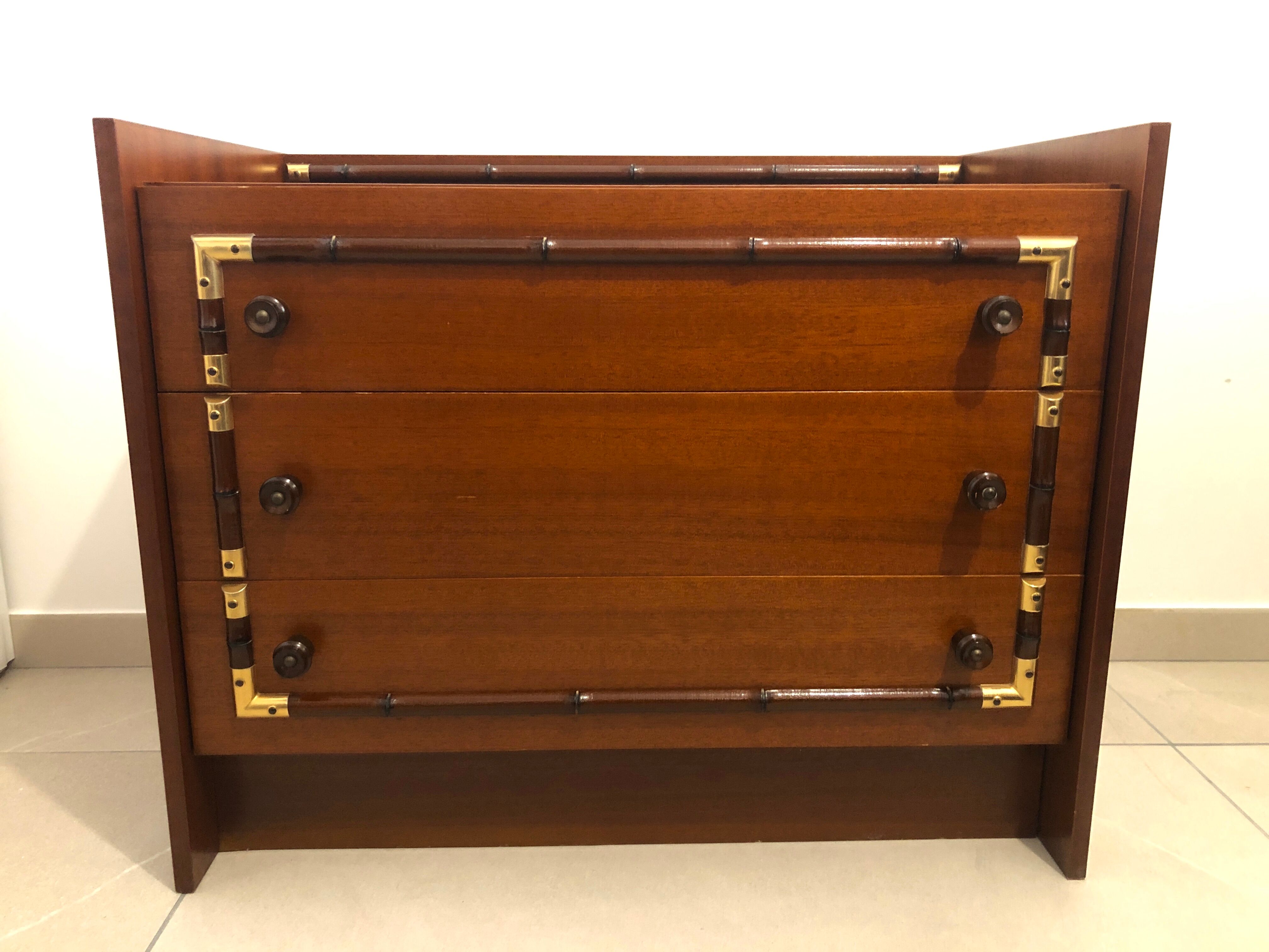 Vintage wooden and gilded chest of drawers colonial style