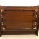 Vintage wooden and gilded chest of drawers colonial style