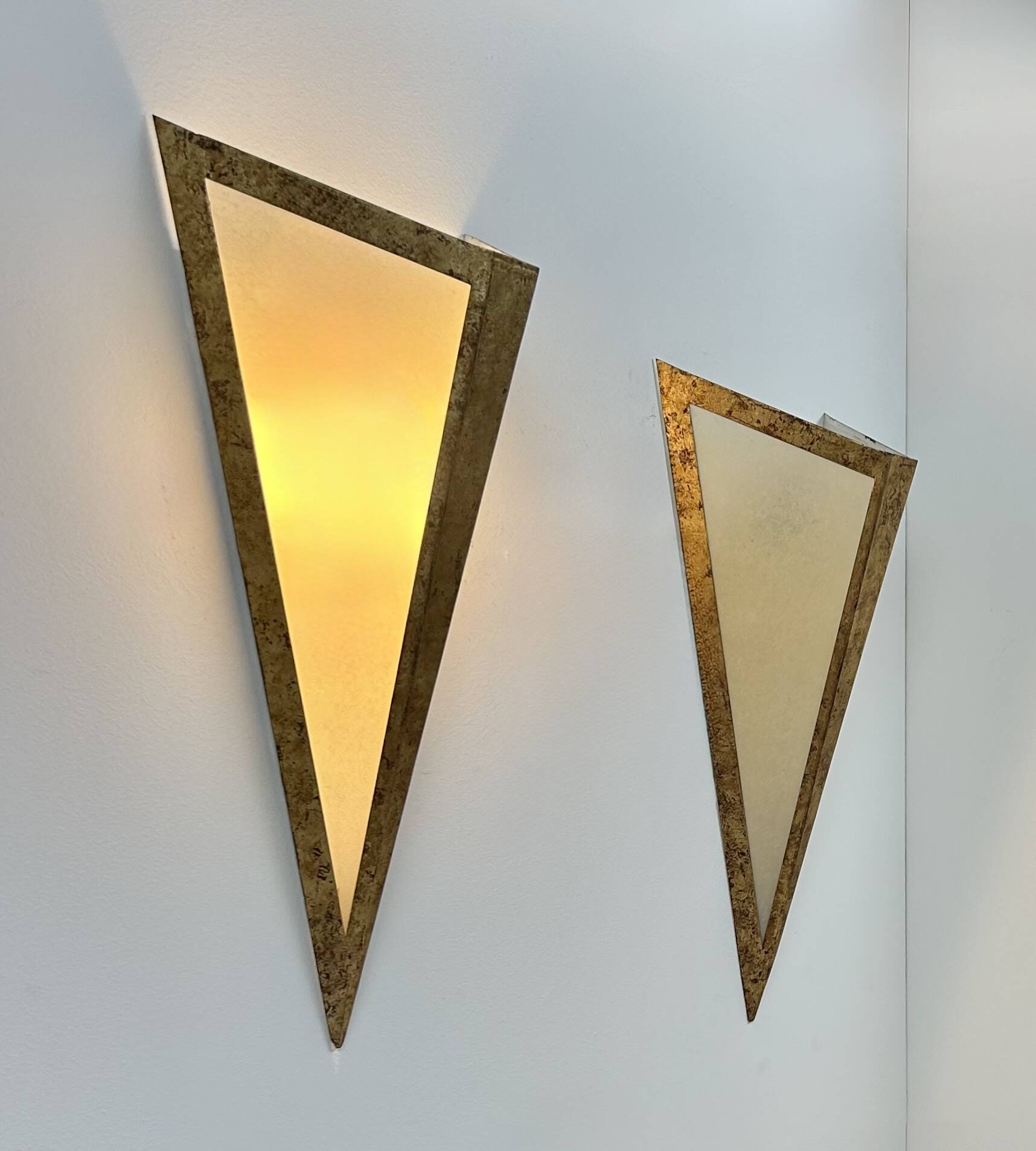 Pair of XL vintage wall lights in gilded metal and parchment, France, 1970.