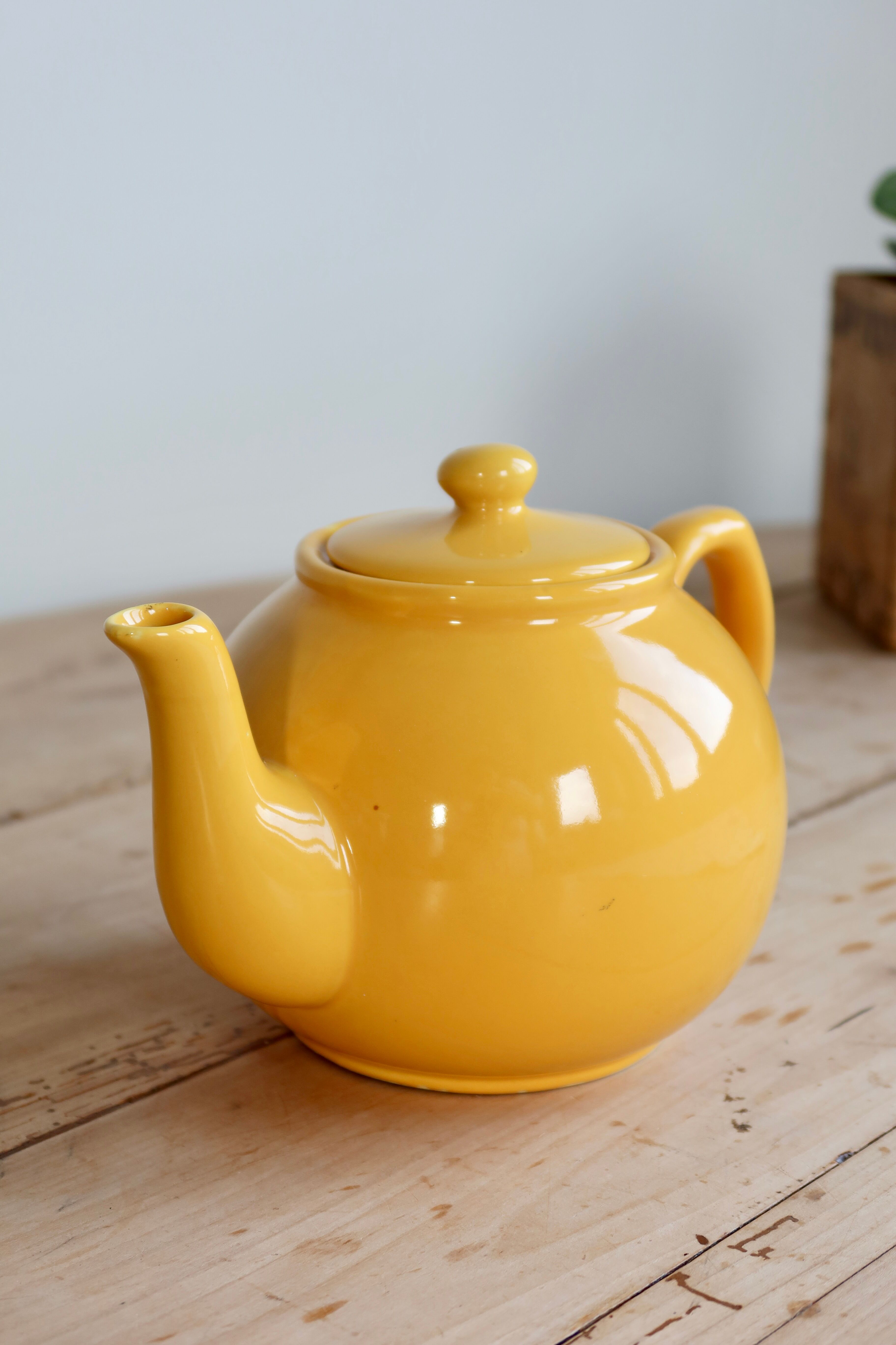 Vintage bright yellow ceramic teapot