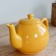 Vintage bright yellow ceramic teapot