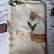 Tablecloth and napkins with a spring theme, vintage tulips, new polyester.