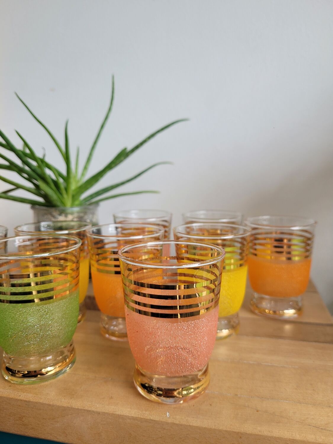 Set of 9 gilded granite glasses